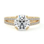 Round cut Cathedral Double claw set Moissanite lab grown diamond engagement ring with pave set V_split shank on a gold band, against a white background.Moissanite engagement ring cape town south africa grand diamonds ralph jacobs jeulia 