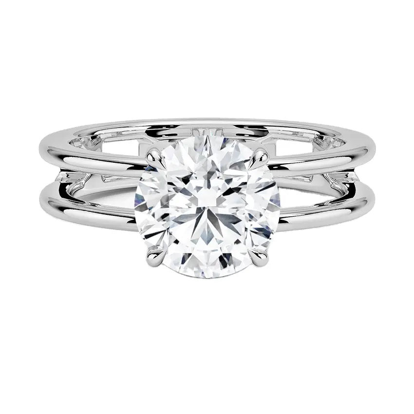 Round cut Moissanite lab grown diamond engagement ring double band with a four claw setting, on a gold band, against a white background.Moissanite engagement ring cape town south africa grand diamonds ralph jacobs jeulia