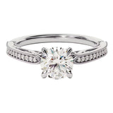 Round cut Moissanite lab grown diamond engagement ring with bridal stacking  pave on a gold band, against a white background.Moissanite engagement ring cape town south africa grand diamonds ralph jacobs jeulia 