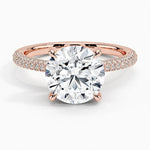 Round cut Moissanite lab grown diamond engagement ring with three row micro pave set gold shank, hidden halo and encrusted claws against a white background.Moissanite engagement ring cape town south africa grand diamonds ralph jacobs jeulia 