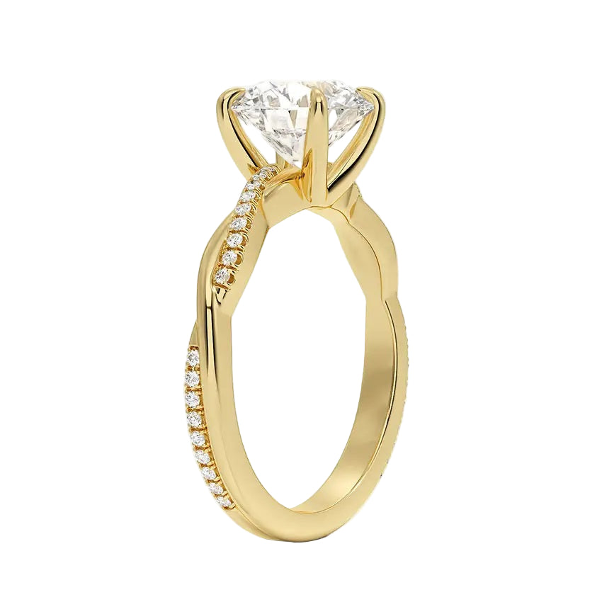 Round cut Moissanite lab grown diamond engagement ring with single side pave set twisted shank on a gold band, against a white background.Moissanite engagement ring cape town south africa grand diamonds ralph jacobs jeulia 