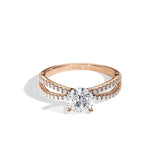 Round cut Moissanite lab grown diamond engagement ring with split pave set gold shank, against a white background.Moissanite engagement ring cape town south africa grand diamonds ralph jacobs jeulia 