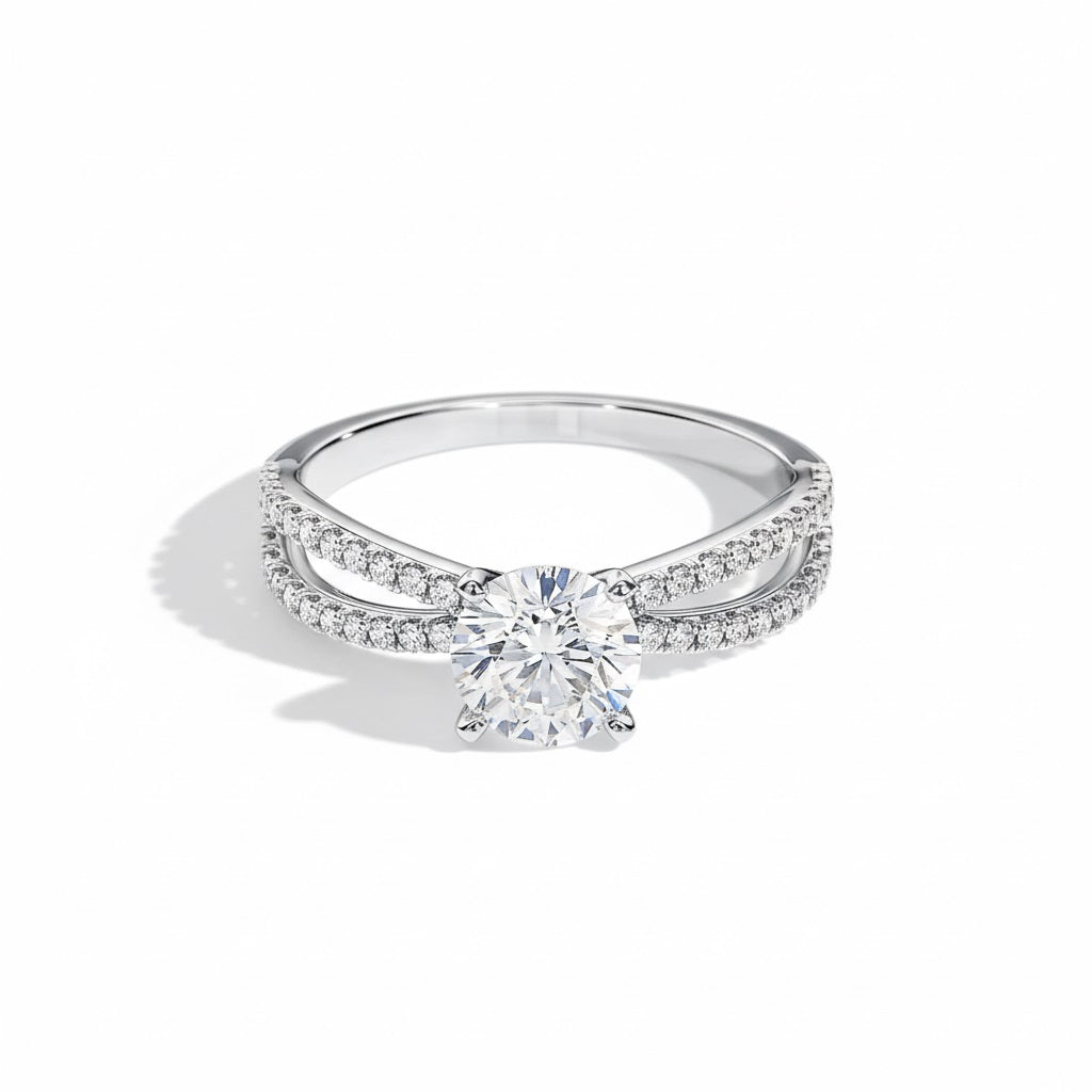 Round cut Moissanite lab grown diamond engagement ring with split pave set gold shank, against a white background.Moissanite engagement ring cape town south africa grand diamonds ralph jacobs jeulia 