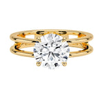 Round cut Moissanite lab grown diamond engagement ring double band with a four claw setting, on a gold band, against a white background.Moissanite engagement ring cape town south africa grand diamonds ralph jacobs jeulia  