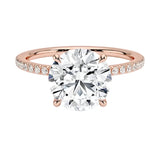 Engagement ring with round cut moissanite or lab grown diamond solitaire four cat claw  moissanite ecrasted setting yellow rose or white gold hidden halo and pave set shank Cape Town South Africa grand diamonds ralph jacobs jeuli