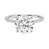 Engagement ring with round cut moissanite or lab grown diamond solitaire four cat claw  moissanite ecrasted setting yellow rose or white gold hidden halo and pave set shank Cape Town South Africa grand diamonds ralph jacobs jeuli