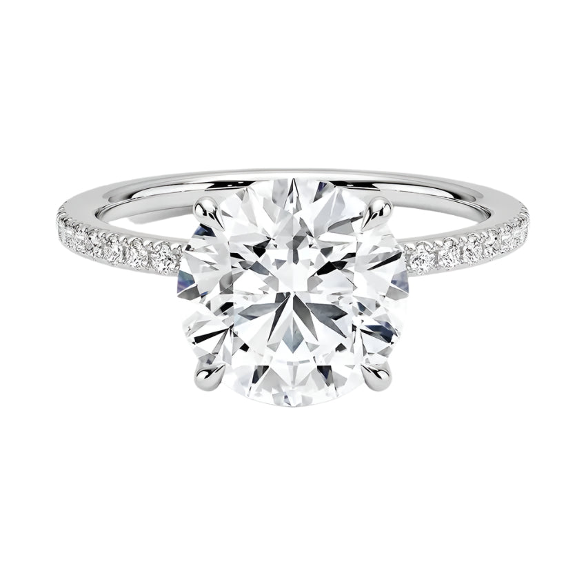 Engagement ring with round cut moissanite or lab grown diamond solitaire four cat claw  moissanite ecrasted setting yellow rose or white gold hidden halo and pave set shank Cape Town South Africa grand diamonds ralph jacobs jeuli