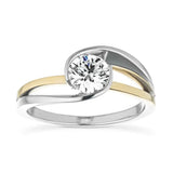 Round cut Moissanite lab grown diamond engagement ring  tension inspired wrap setting, on a two-tone gold band, against a white background.Moissanite engagement ring cape town south africa grand diamonds ralph jacobs jeulia 