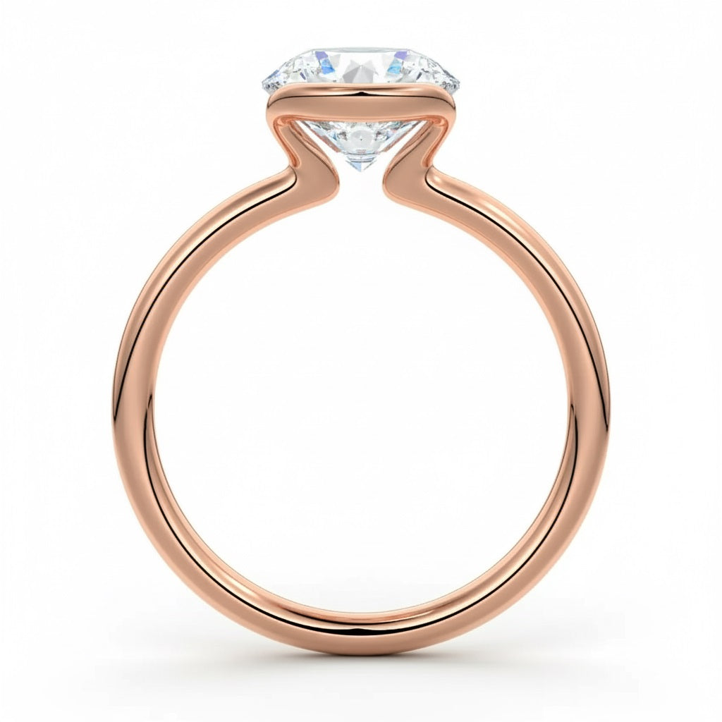 Engagement ring Round cut Moissanite lab grown diamond engagement ring  with open tube setting, on a gold band, against a white background.Moissanite engagement ring cape town south africa grand diamonds ralph jacobs jeulia 