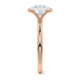 Engagement ring Round cut Moissanite lab grown diamond engagement ring  with open tube setting, on a gold band, against a white background.Moissanite engagement ring cape town south africa grand diamonds ralph jacobs jeulia 