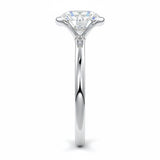 Engagement ring Round cut Moissanite lab grown diamond engagement ring  with open tube setting, on a gold band, against a white background.Moissanite engagement ring cape town south africa grand diamonds ralph jacobs jeulia 