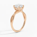 Round cut Moissanite lab grown diamond engagement ring twisted  band with a four claw setting, on a gold band, against a white background.Moissanite engagement ring cape town south africa grand diamonds ralph jacobs jeulia  