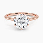 Round cut Moissanite lab grown diamond engagement ring round band with a six claw setting, on a gold band, against a white background.Moissanite engagement ring cape town south africa grand diamonds ralph jacobs jeulia  