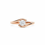 Engagement ring round cut Moissanite lab grown diamond tension set shank with a four claw setting, on a gold band, against a white background.Moissanite engagement ring cape town south africa grand diamonds ralph jacobs jeulia 
