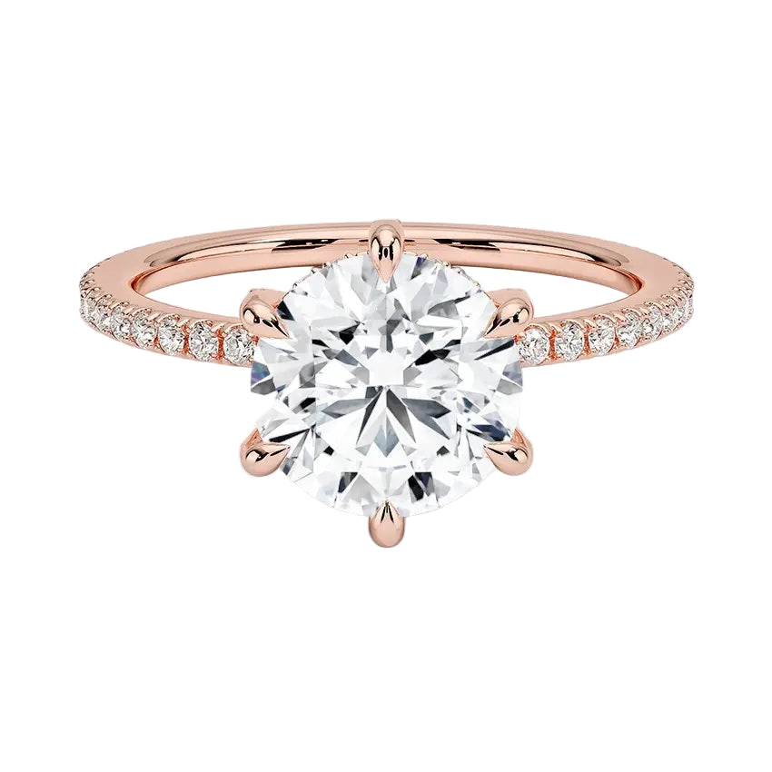 Engagement ring with round cut moissanite or lab grown diamond solitaire six cat claw setting yellow rose or white gold hidden halo wit stones encrusted claws and pave set shank Cape Town South Africa grand diamonds ralph jacobs jeuli