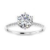 Round cut Moissanite lab grown diamond engagement ring with pave set shank with six  prong setting, on a gold band, against a white background.Moissanite engagement ring cape town south africa grand diamonds ralph jacobs jeulia 