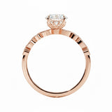 Round cut Moissanite lab grown diamond engagement ring with fancy set pave gold band, against a white background.Moissanite engagement ring cape town south africa grand diamonds ralph jacobs jeulia 