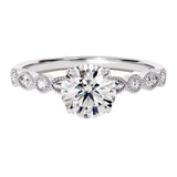 Round cut Moissanite lab grown diamond engagement ring with fancy set pave gold band, against a white background.Moissanite engagement ring cape town south africa grand diamonds ralph jacobs jeulia 