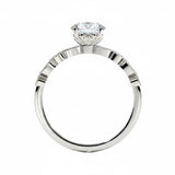 Round cut Moissanite lab grown diamond engagement ring with fancy set pave gold band, against a white background.Moissanite engagement ring cape town south africa grand diamonds ralph jacobs jeulia 