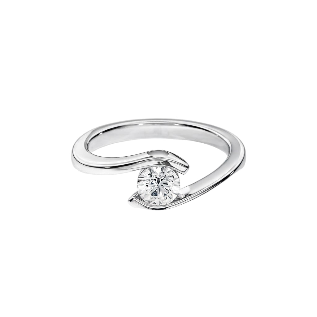 Engagement ring round cut Moissanite lab grown diamond tension set shank with a four claw setting, on a gold band, against a white background.Moissanite engagement ring cape town south africa grand diamonds ralph jacobs jeulia 