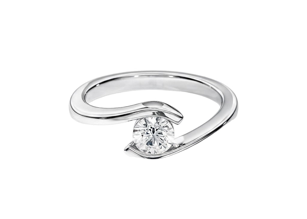 Engagement ring round cut Moissanite lab grown diamond tension set shank with a four claw setting, on a gold band, against a white background.Moissanite engagement ring cape town south africa grand diamonds ralph jacobs jeulia 