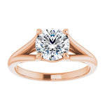 Engagement ring Cathedral setting round cut Moissanite lab grown diamond engagement ring v-Split round shank with a four claw setting, on a gold band, against a white background.Moissanite engagement ring cape town south africa grand diamonds ralph jacobs jeulia 