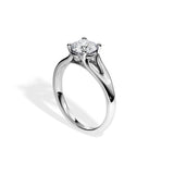 Oval cut Moissanite lab grown diamond engagement ring round v-split shank with pin  four claw setting, on a gold band, against a white background.Moissanite engagement ring cape town south africa grand diamonds ralph jacobs jeulia 