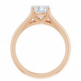 Engagement ring Cathedral setting round cut Moissanite lab grown diamond engagement ring v-Split round shank with a four claw setting, on a gold band, against a white background.Moissanite engagement ring cape town south africa grand diamonds ralph jacobs jeulia 