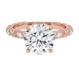 Round cut Moissanite lab grown diamond engagement ring with classic set centre stone and vintage set stones on the band, against a white background.Moissanite engagement ring cape town south africa grand diamonds ralph jacobs jeulia 