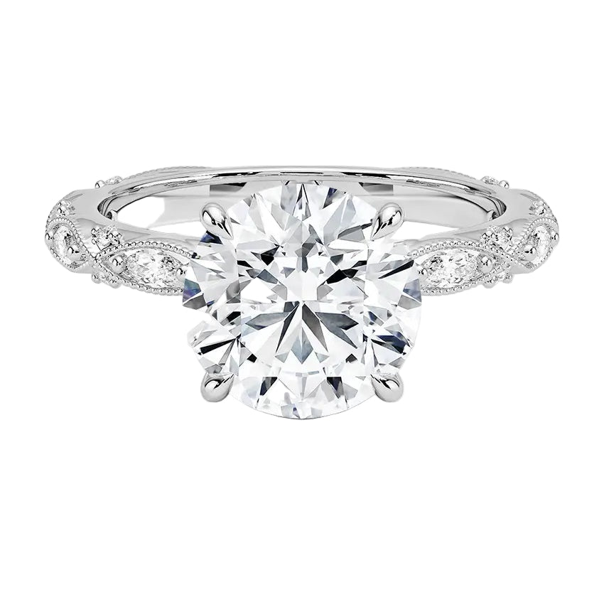 Round cut Moissanite lab grown diamond engagement ring with classic set centre stone and vintage set stones on the band, against a white background.Moissanite engagement ring cape town south africa grand diamonds ralph jacobs jeulia 