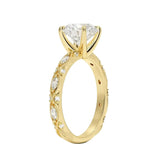 Round cut Moissanite lab grown diamond engagement ring with classic set centre stone and vintage set stones on the band, against a white background.Moissanite engagement ring cape town south africa grand diamonds ralph jacobs jeulia 