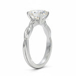 Oval cut Moissanite lab grown diamond engagement ring braided shank with a four claw setting, on a gold band, against a white background.Moissanite engagement ring cape town south africa grand diamonds ralph jacobs jeulia 