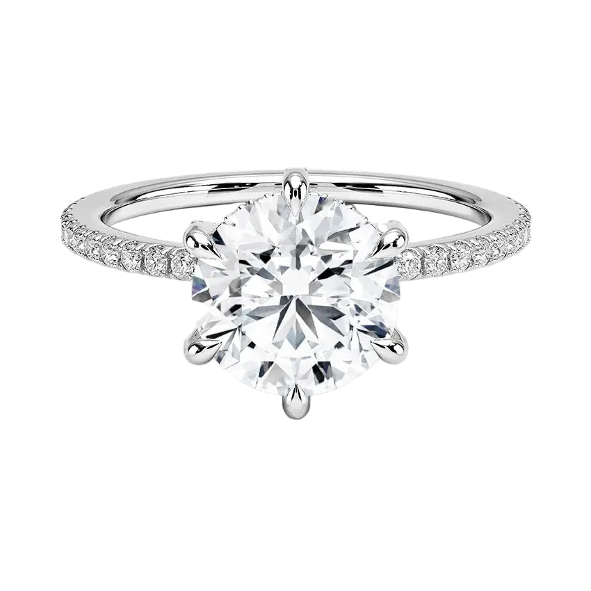 Engagement ring with round cut moissanite or lab grown diamond solitaire six cat claw setting yellow rose or white gold hidden halo wit stones encrusted claws and pave set shank Cape Town South Africa grand diamonds ralph jacobs jeuli