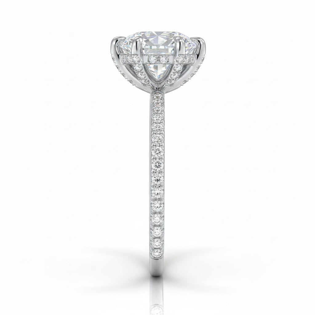 Engagement ring with round cut moissanite or lab grown diamond solitaire six cat claw setting yellow rose or white gold hidden halo wit stones encrusted claws and pave set shank Cape Town South Africa grand diamonds ralph jacobs jeuli