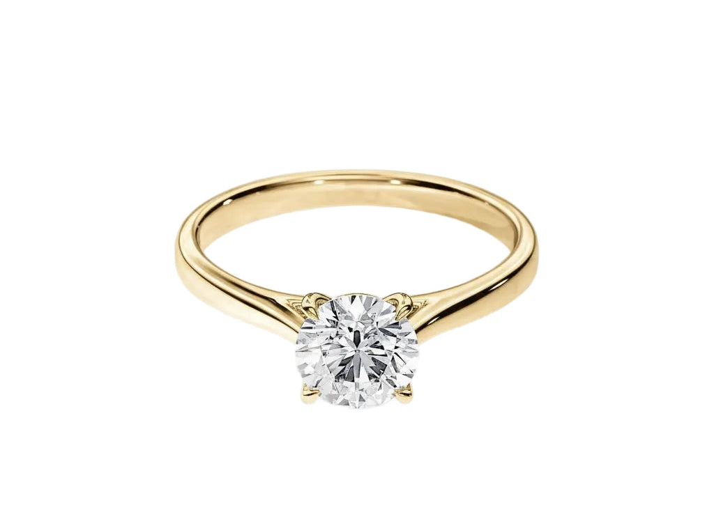 Engagement ring Cathedral setting round cut Moissanite lab grown diamond engagement ring round shank with a four claw setting, on a gold band, against a white background.Moissanite engagement ring cape town south africa grand diamonds ralph jacobs jeulia 