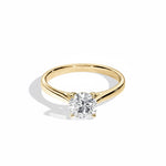 Engagement ring Cathedral setting round cut Moissanite lab grown diamond engagement ring round shank with a four claw setting, on a gold band, against a white background.Moissanite engagement ring cape town south africa grand diamonds ralph jacobs jeulia 