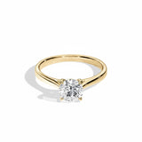 Engagement ring Cathedral setting round cut Moissanite lab grown diamond engagement ring round shank with a four claw setting, on a gold band, against a white background.Moissanite engagement ring cape town south africa grand diamonds ralph jacobs jeulia 