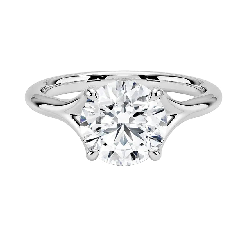 Engagement ring Round cut Moissanite lab grown diamond engagement ring v-Split round shank with a four cat-claw setting, on a gold band, against a white background.Moissanite engagement ring cape town south africa grand diamonds ralph jacobs jeulia 