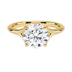 Engagement ring Round cut Moissanite lab grown diamond engagement ring v-Split round shank with a four cat-claw setting, on a gold band, against a white background.Moissanite engagement ring cape town south africa grand diamonds ralph jacobs jeulia 