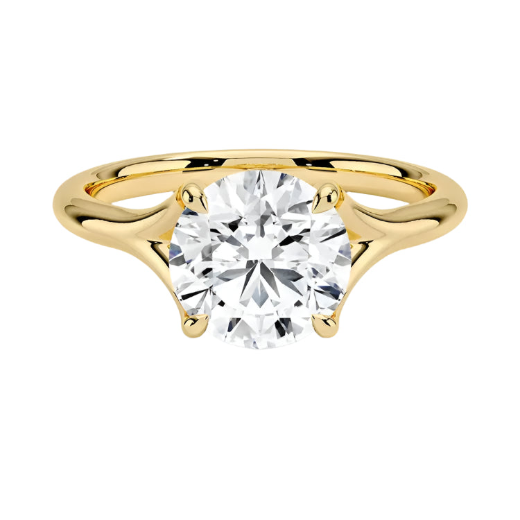 Engagement ring Round cut Moissanite lab grown diamond engagement ring v-Split round shank with a four cat-claw setting, on a gold band, against a white background.Moissanite engagement ring cape town south africa grand diamonds ralph jacobs jeulia 