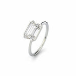 Emerald cut Moissanite lab grown diamond engagement ring column clean sophisticated design on a gold band, against a white background.Moissanite engagement ring cape town south africa grand diamonds ralph jacobs jeuli