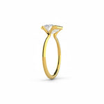 Emerald cut Moissanite lab grown diamond engagement ring column clean sophisticated design on a gold band, against a white background.Moissanite engagement ring cape town south africa grand diamonds ralph jacobs jeuli