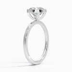 Round cut Moissanite lab grown diamond engagement ring round shank with a bezel setting, on a gold band, against a white background.Moissanite engagement ring cape town south africa grand diamonds ralph jacobs jeulia 