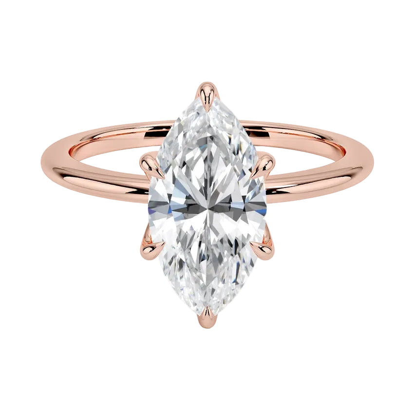 Marquise cut Moissanite lab grown diamond engagement ring round band with a six claw setting, on a gold band, against a white background.Moissanite engagement ring cape town south africa grand diamonds ralph jacobs jeulia  