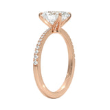 Oval cut Moissanite lab grown diamond engagement ring with tapered pave set shank on a gold band, against a white background.Moissanite engagement ring cape town south africa grand diamonds ralph jacobs jeulia 
