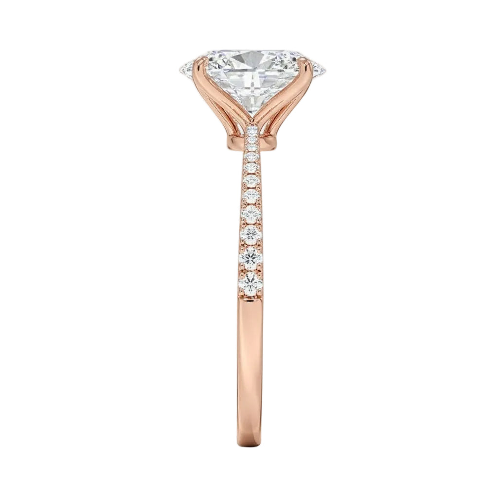Top-down view of a D-color VVS1 oval stone in a polished rose gold tapering pavé setting.