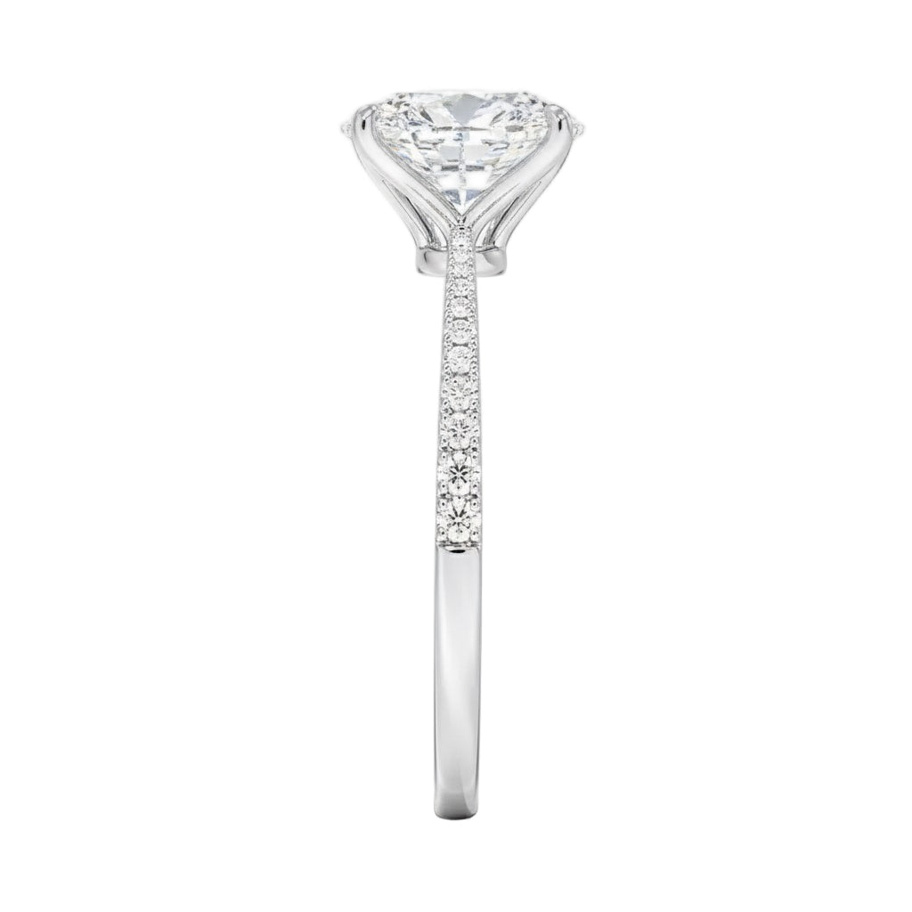 Top-down view of a D-color VVS1 oval stone in a polished white gold tapering pavé setting.