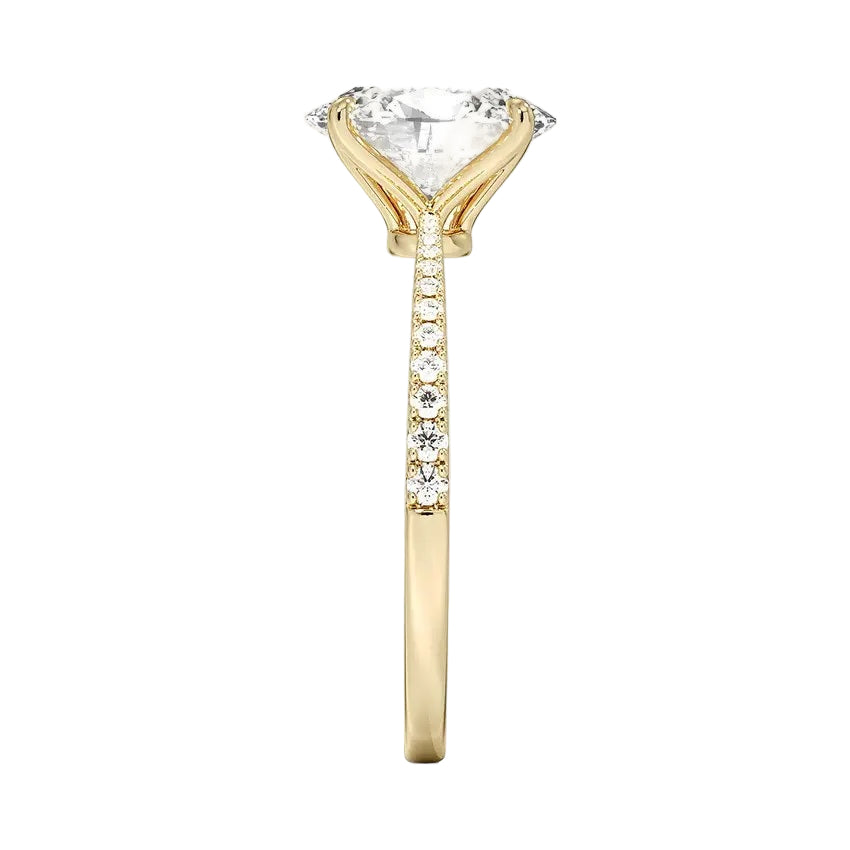 Top-down view of a D-color VVS1 oval stone in a polished yellow gold tapering pavé setting.