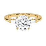 Round brilliant moissanite engagement ring yellow gold tapered baguette side stones South Africa
