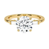Round brilliant moissanite engagement ring yellow gold tapered baguette side stones South Africa